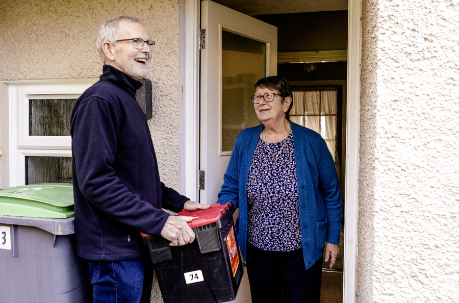 A volunteer for Food Train in Stewartry delivers food to a resident&#39;s door