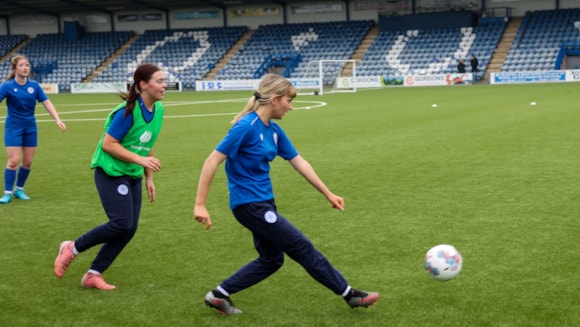 Girls playing Football