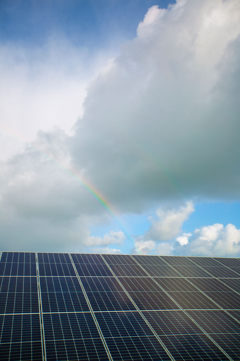 solar panels rainbow clouds